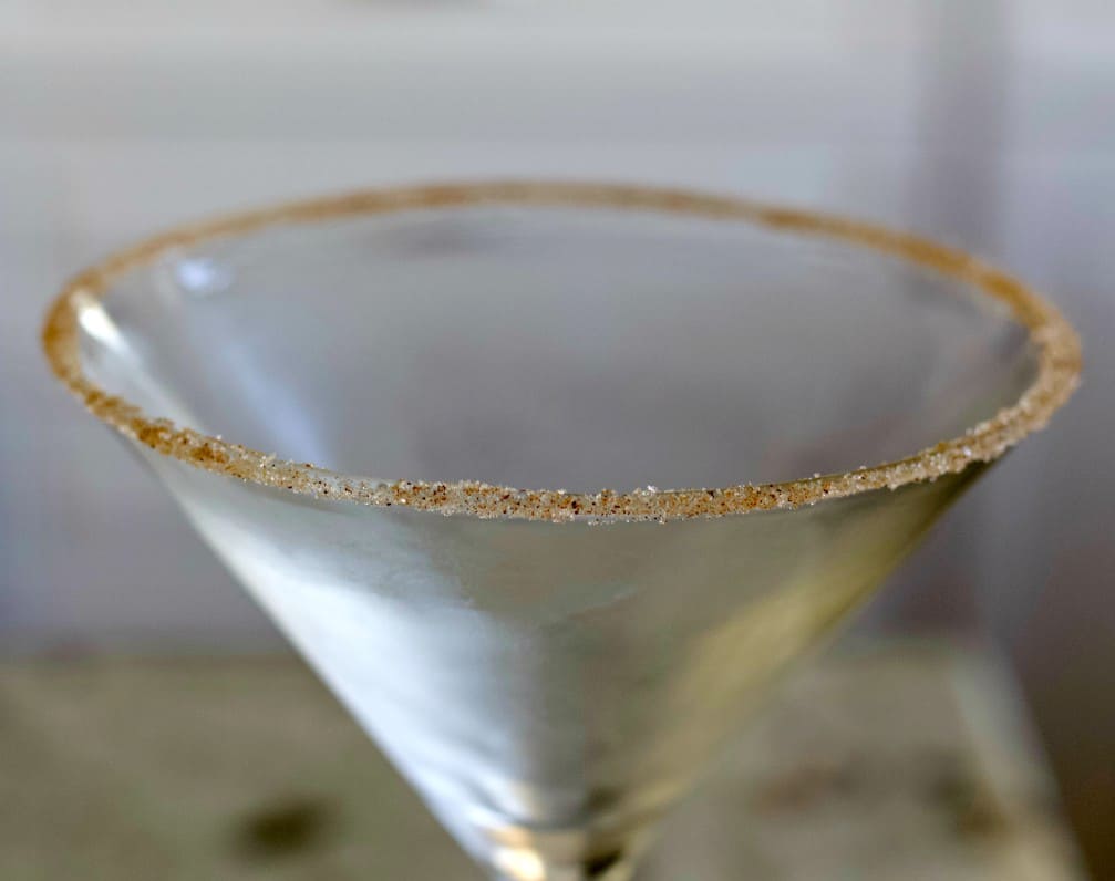 Rimmed martini glass with sugar and pumpkin pie spice