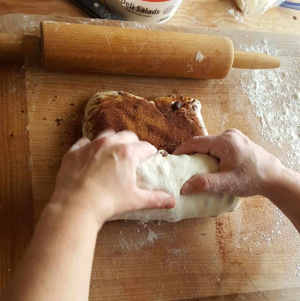 keep tucking the dough-sourdough raisin bread