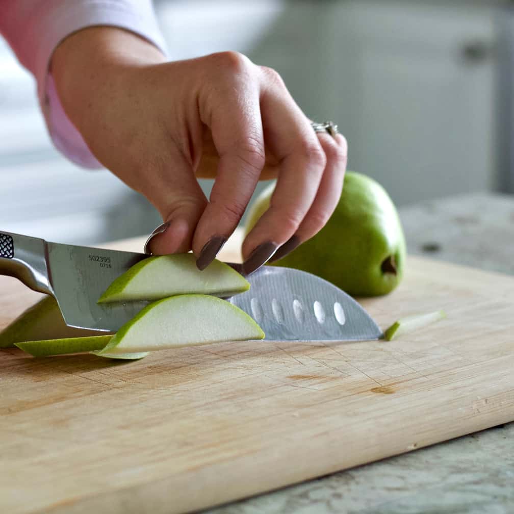 slicing pear for cinnamon pear mimosa