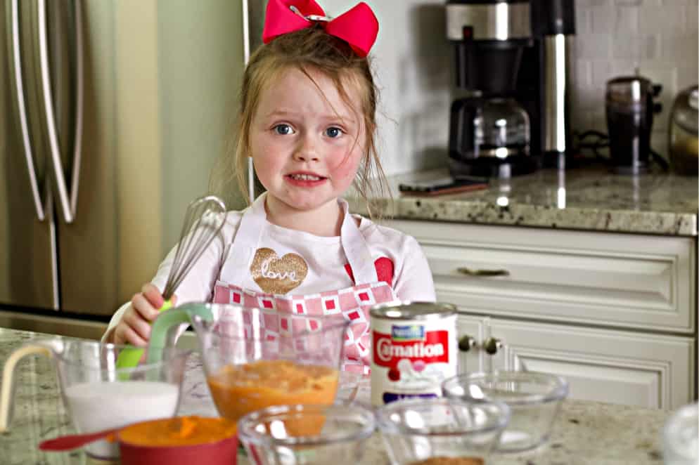 Ellie with sweet potato pumpkin pie ingredients