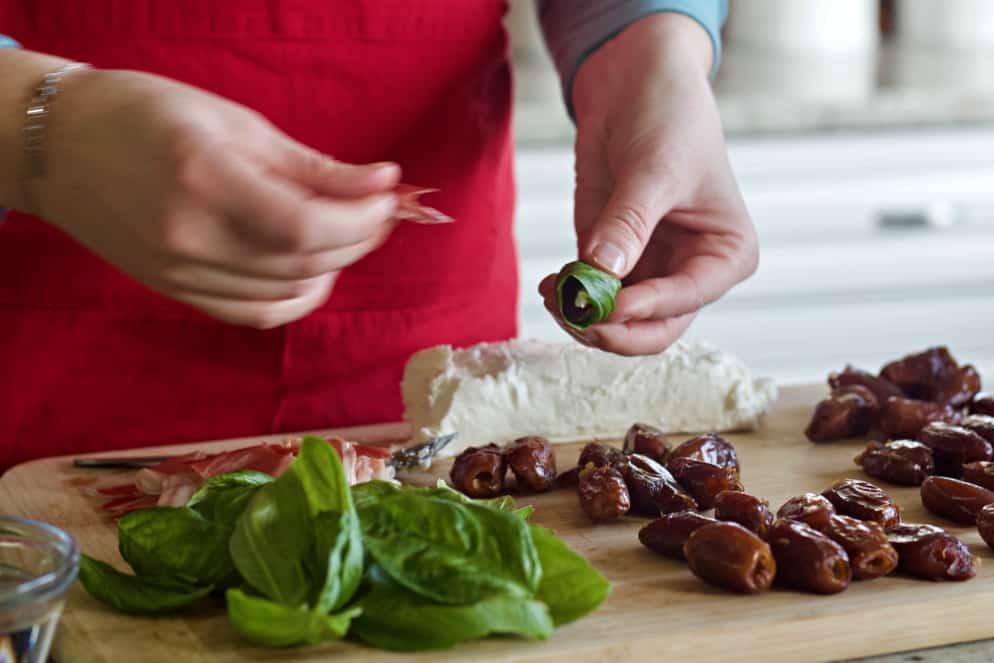 wrap prosciutto around the fresh basil