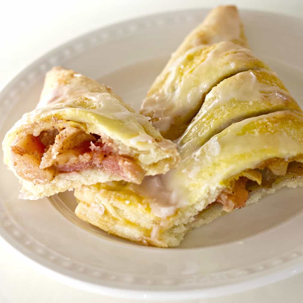 Homemade Apple Turnover Recipe with Puff Pastry 6 Broken apple turnover on a plate