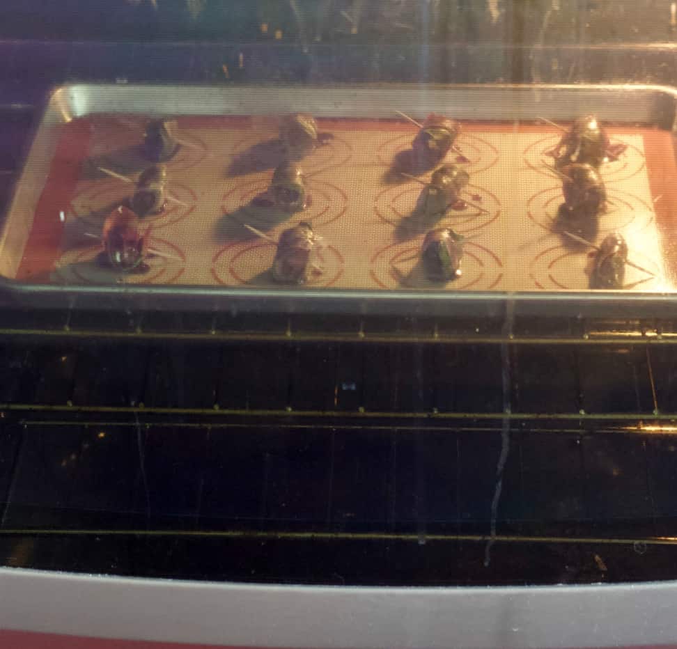 wrapped dates baking in the oven.
