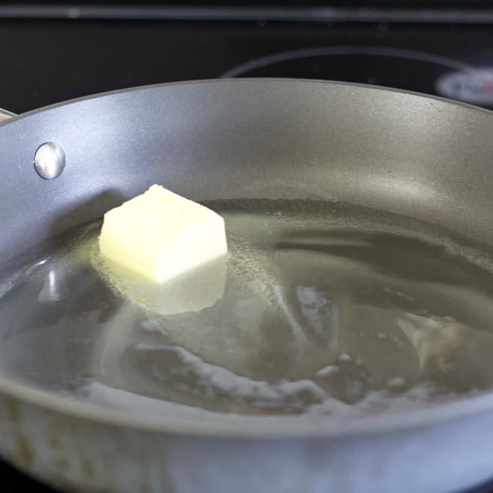 butter melting in skillet