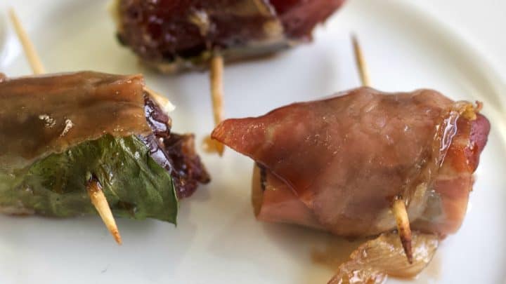 prosciutto wrapped dates with goat cheese and basil