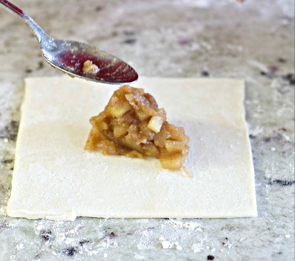 Homemade Apple Turnover Recipe with Puff Pastry 16 spoon the apple filling onto the pastry
