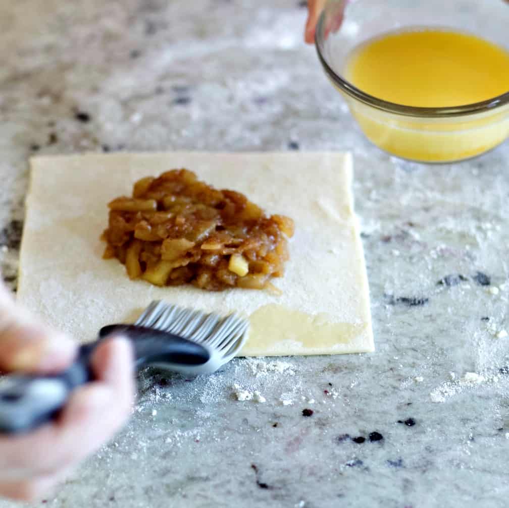 Homemade Apple Turnover Recipe with Puff Pastry 17 Brush pastry edge with egg wash