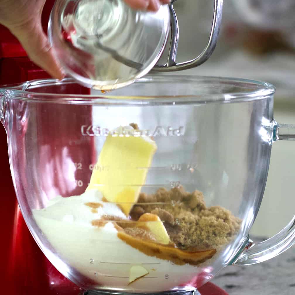 Mixing bowl with brown sugar, vanilla, sugar and butter