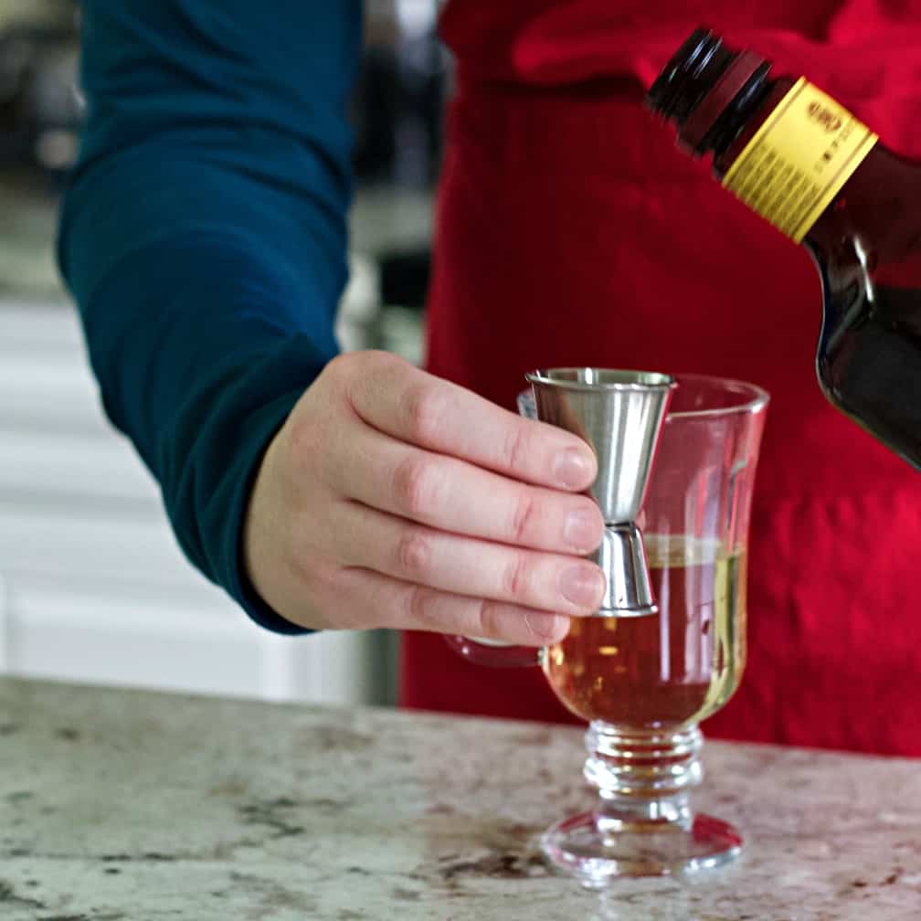 pouring dark rum