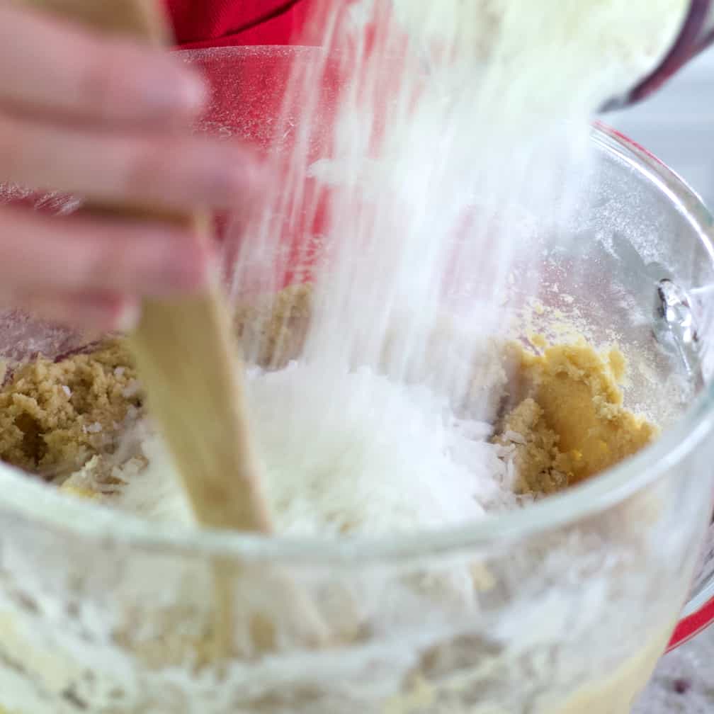 Stir in flour by hand-almond joy cookies