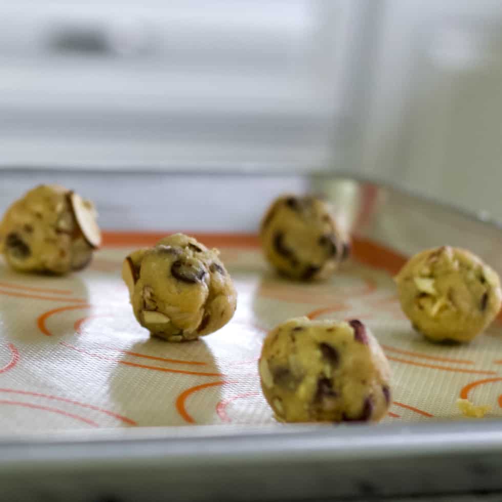 almond joy cookie balls on baking sheet