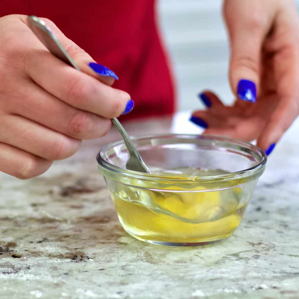stirring the egg and water. Egg wash