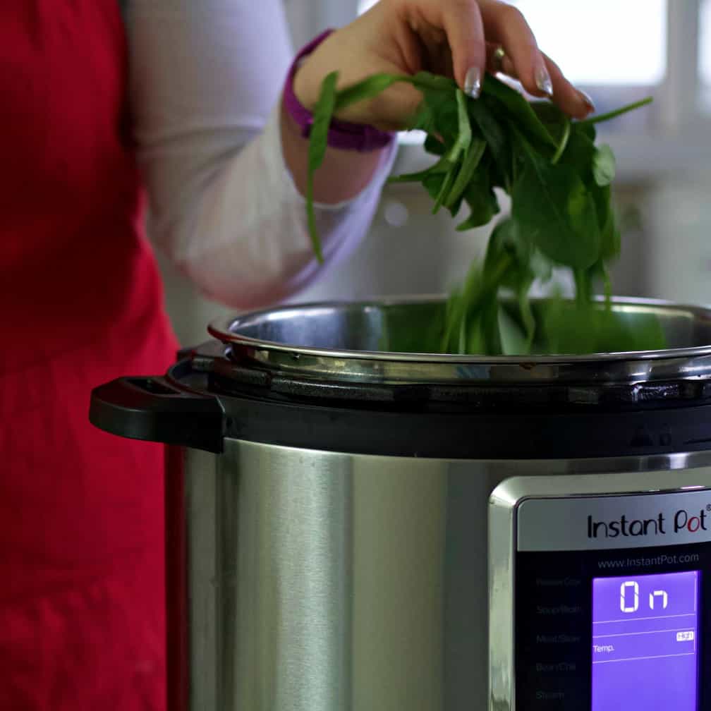 Adding fresh spinach into the instant pot