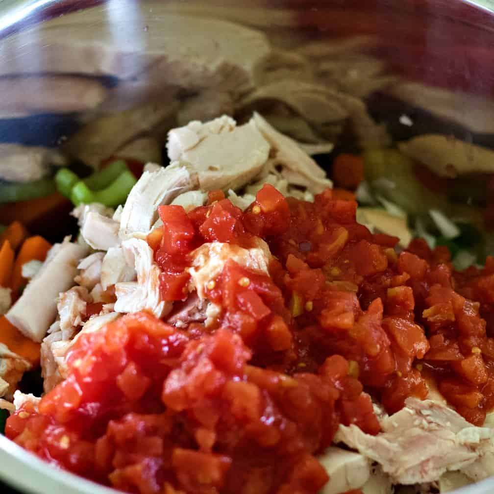 diced tomatoes on chicken