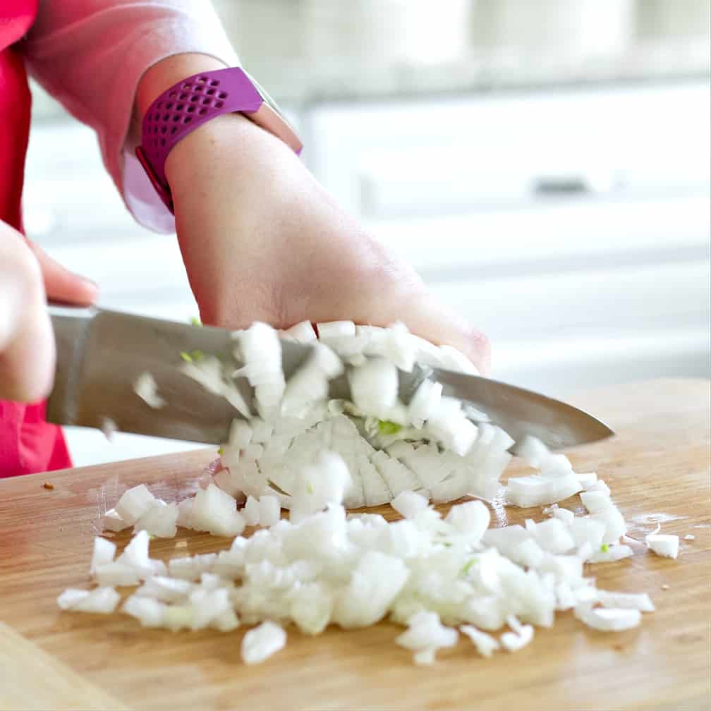 dicing an onion-chicken soup recipe