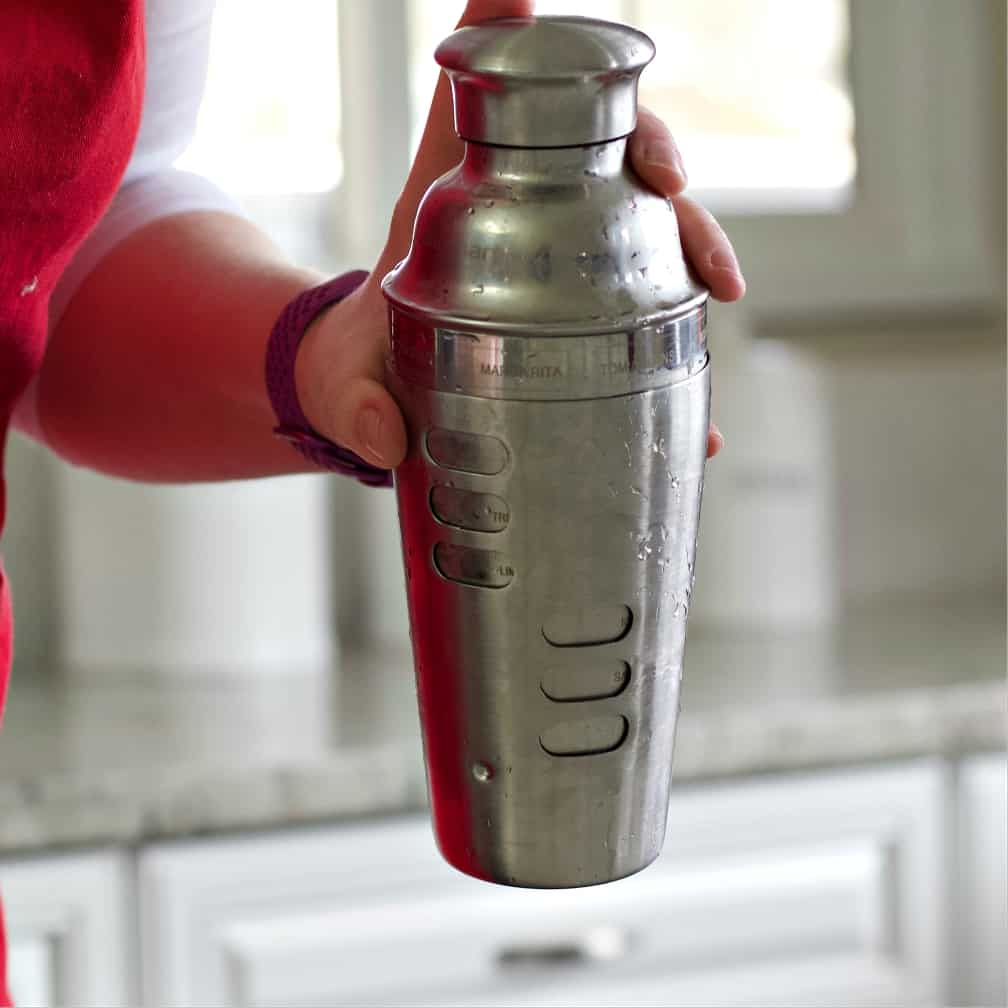 shaking a cocktail.
