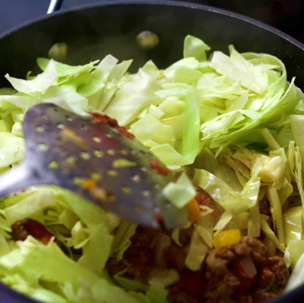 mixing in cabbage