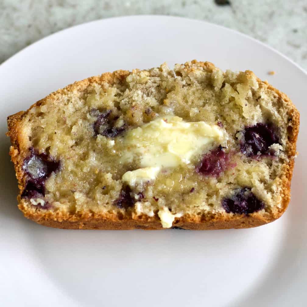 sliced sourdough banana bread with blueberries
