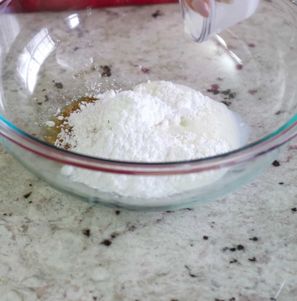adding cream for lemon frosting
