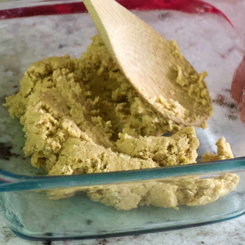 press lemon cookie dough into oiled pan.