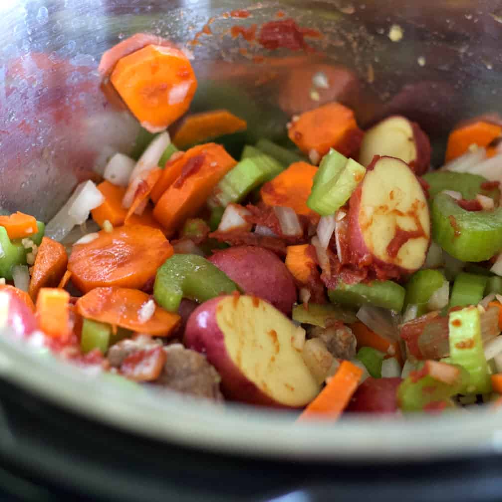 stir in tomato paste