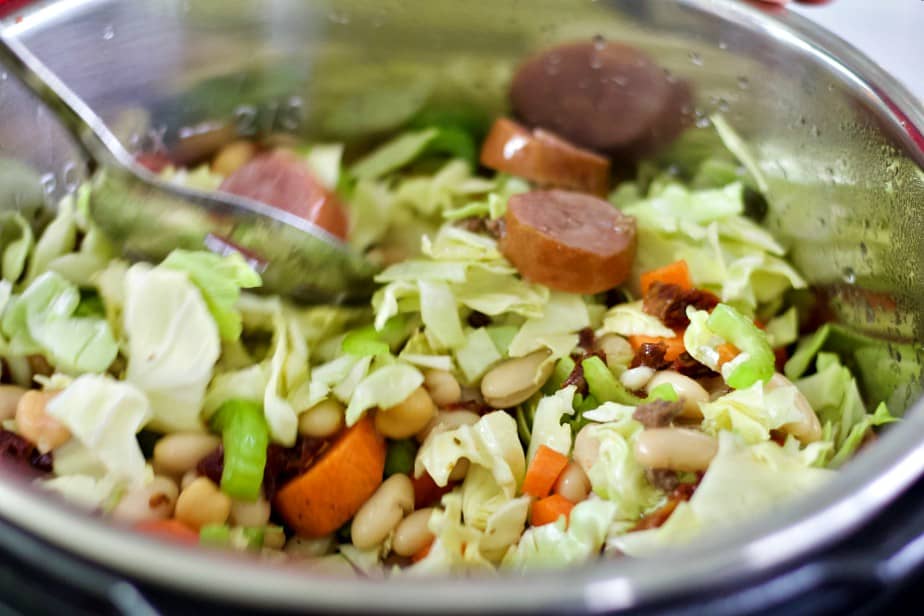 stirring cabbage stew
