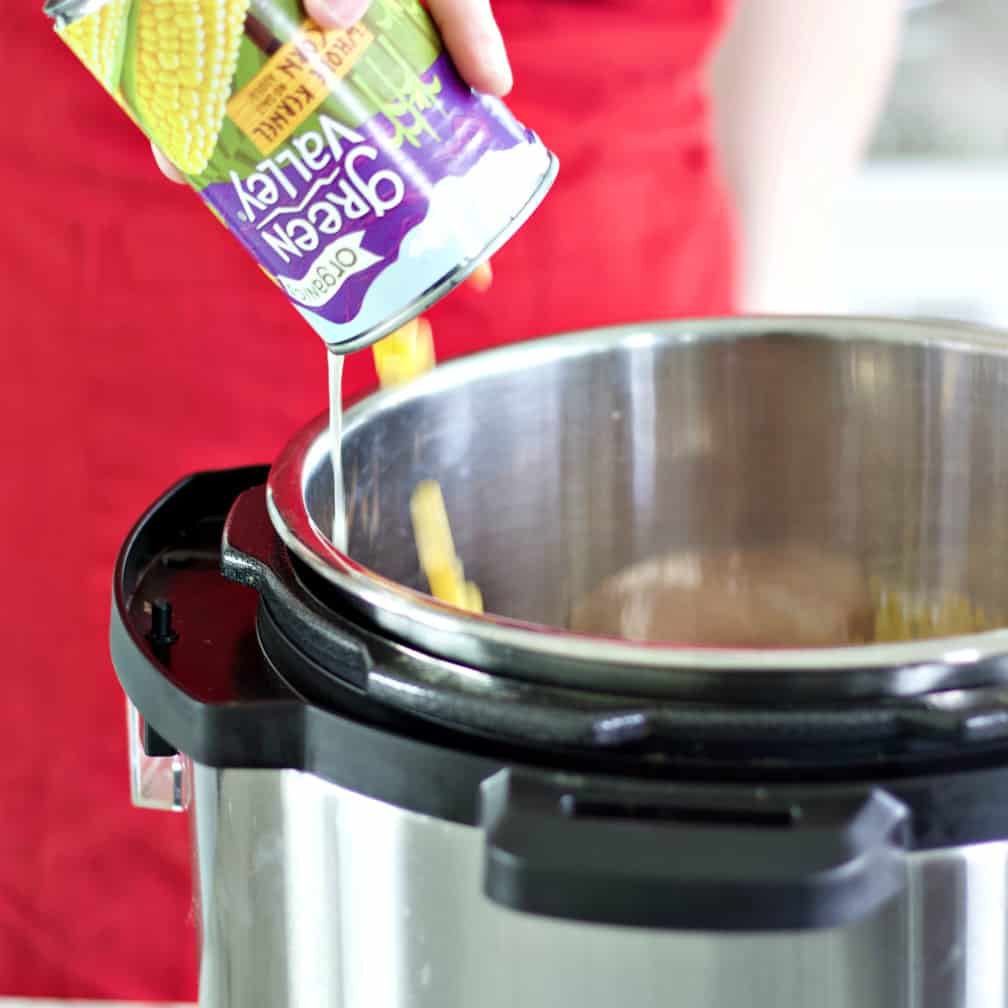 pouring corn into instant pot