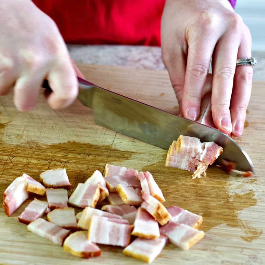 chopping bacon on a wooden board-chicken chili