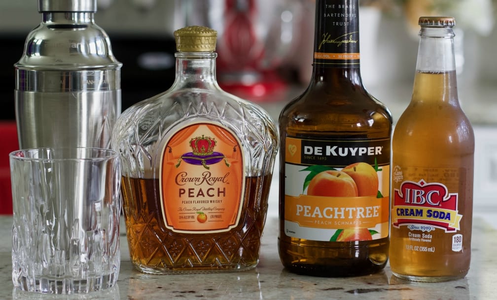 Ingredients for Crown royal peaches and cream whiskey drink. Crown royal peach.