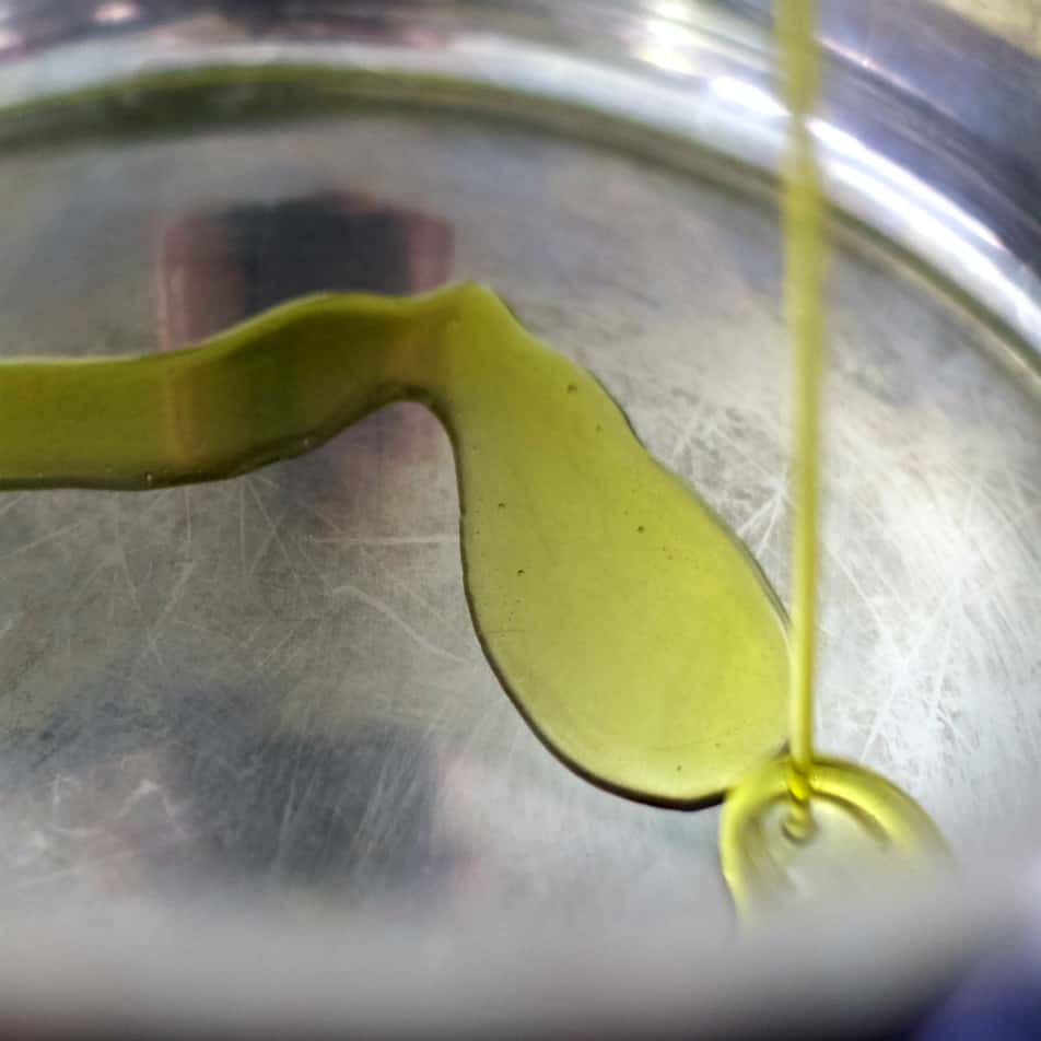 pouring olive oil into instant pot