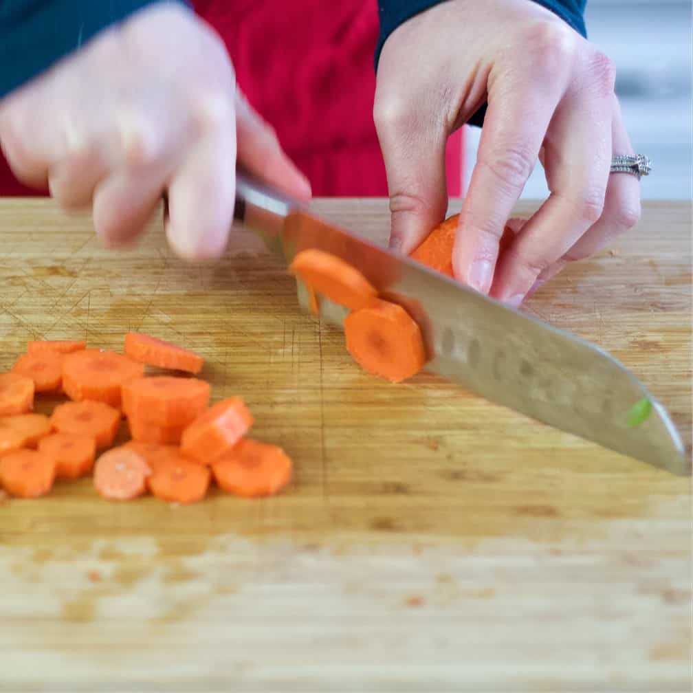 slicing carrots-cabbage beef stew