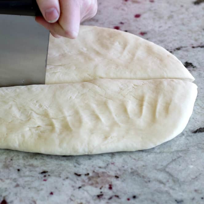 cutting sourdough bagel dough