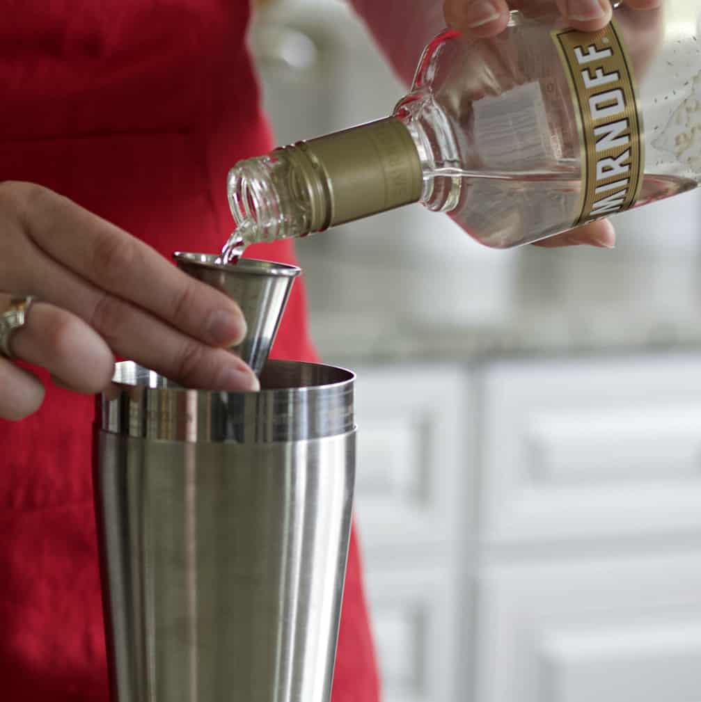 pouring whipped cream vodka