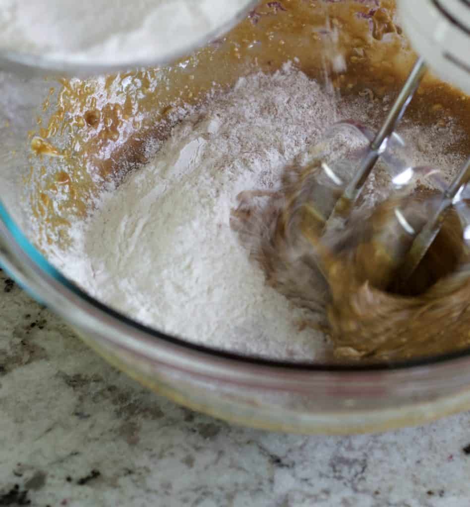 mixing molasses cookies
