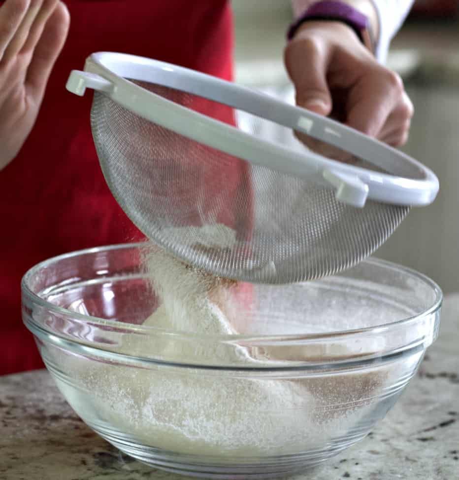 sigting dry ingredients for molasses cookies