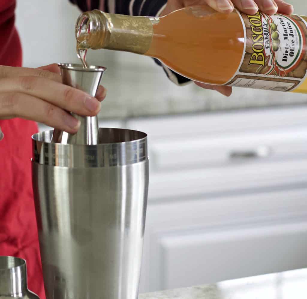 measure out the dirty martini olive juice