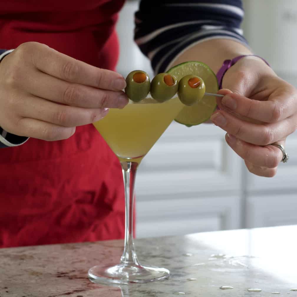 Garnishing Mexican martini