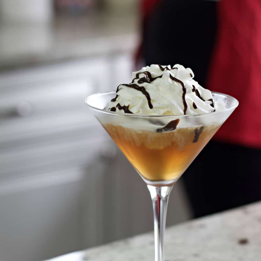 drizzle chocolate syrup over whipped cream