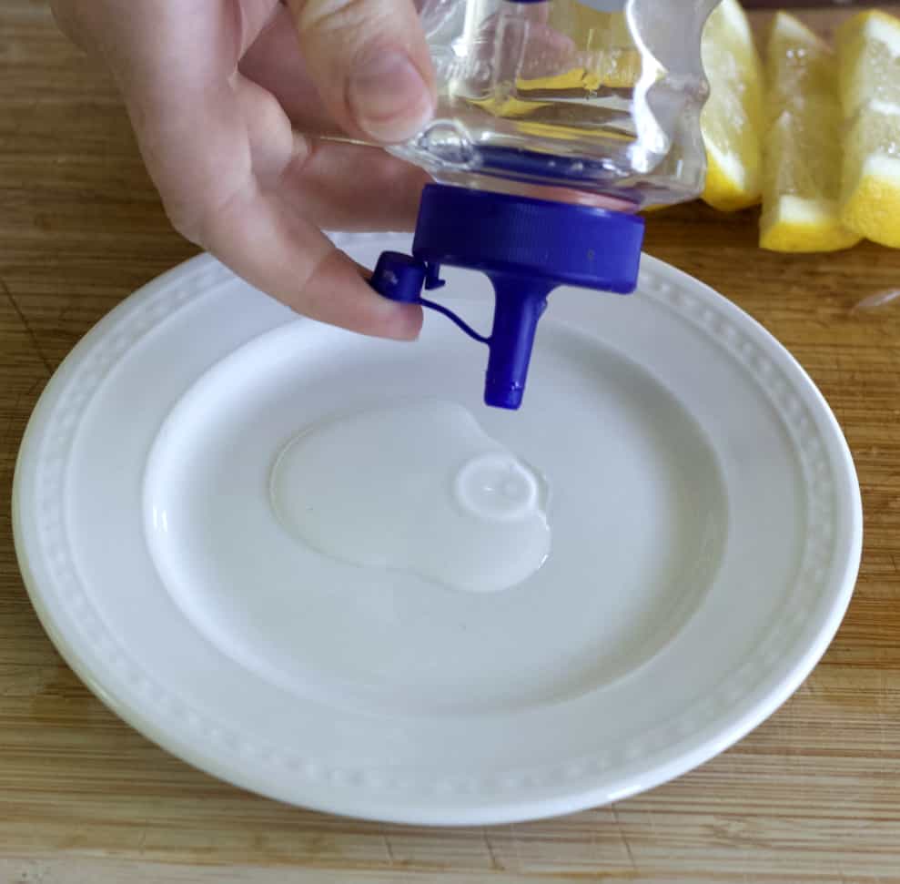 pour simple syrup-rimming glass
