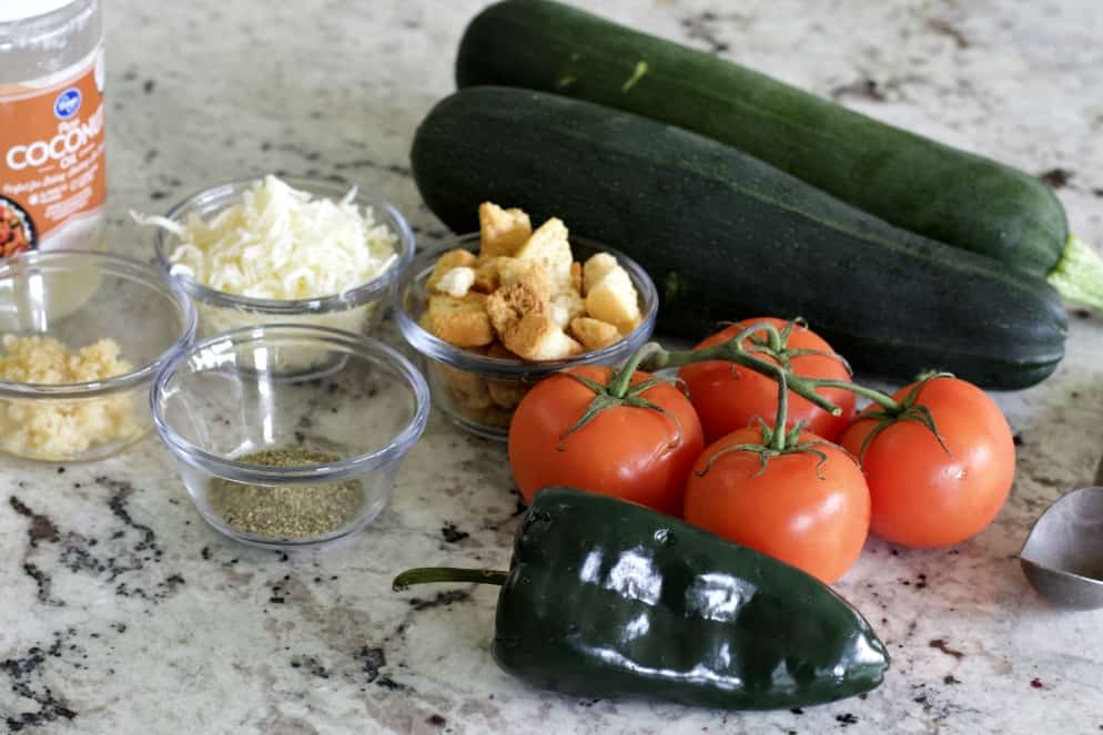 ingredients for stuffed zucchini boats vegetarian recipe Italian style