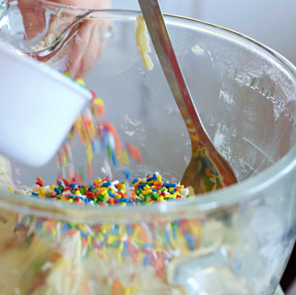Adding sprinkles to cookies dough