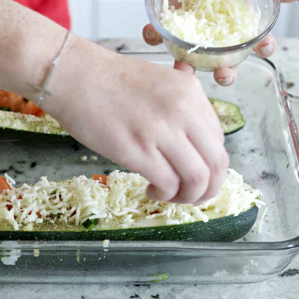 layering cheese-zucchini boats