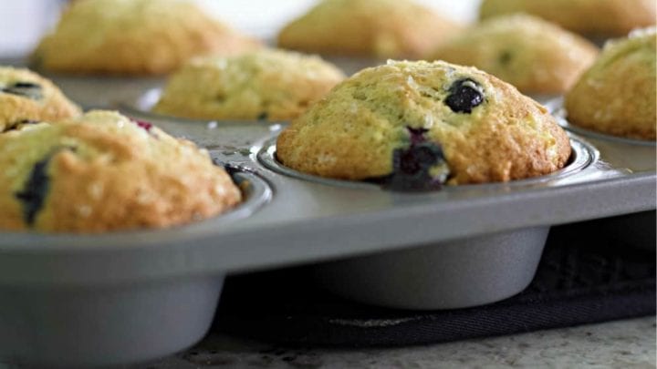 banana blueberry muffin in tin