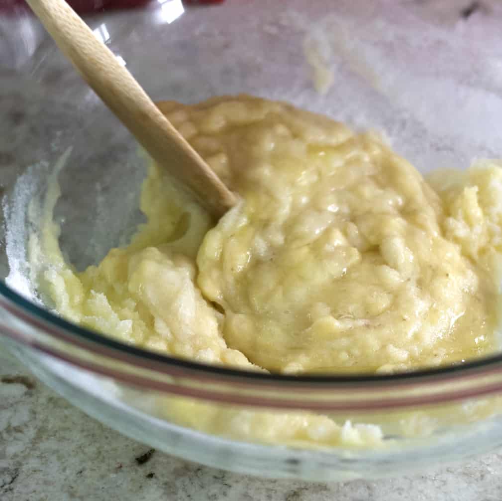 Incredible Banana Blueberry Muffins 7 mixing ripe bananas