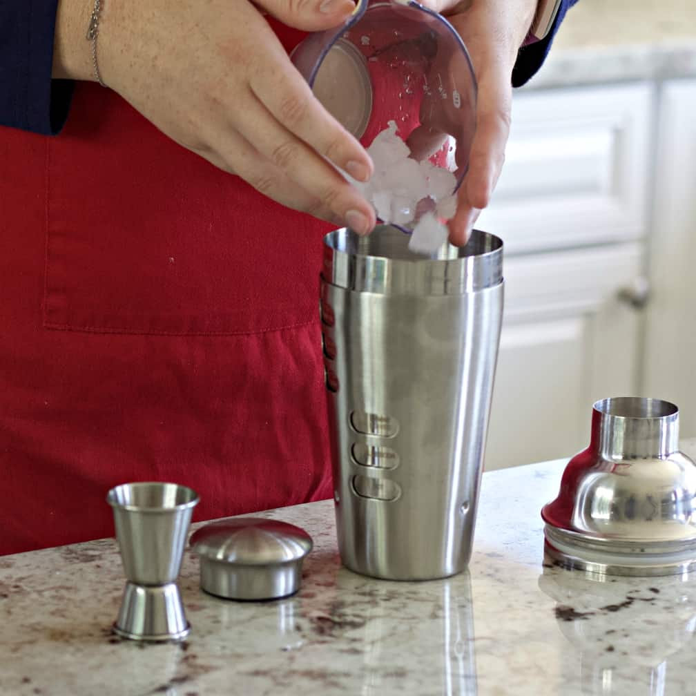 Liquid Marijuana Drinks-Shots and Cocktail Recipes 8 pouring ice into cocktail shaker