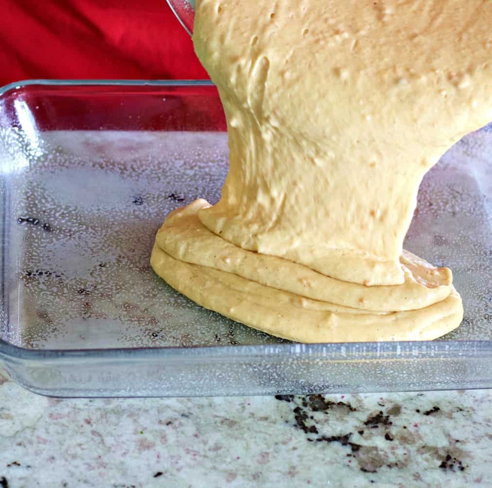 pouring sweet potato cake batter