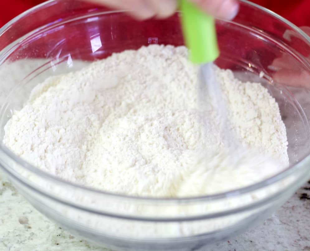 whisking dry ingredients-cranberry bars