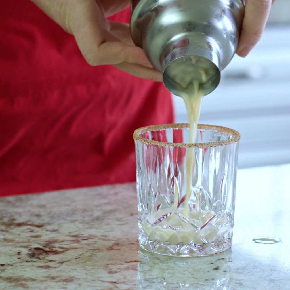 straining apple pie cocktaiil