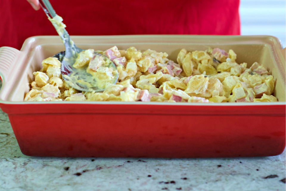 spreading out the casserole