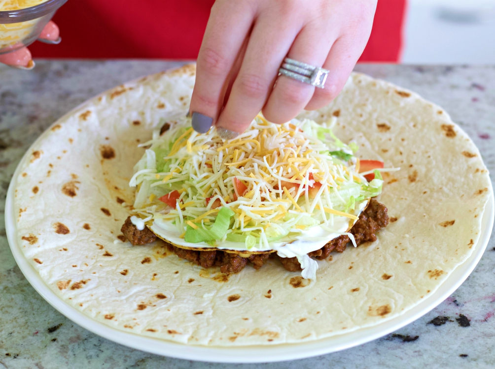 layering on cheese